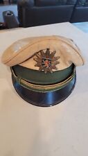 Vintage German Army Hat with Badge picture