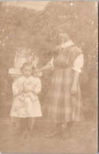 Real Photo Postcard - Woman and Young Girl Holding Teddy Bear - c1901-1907 picture