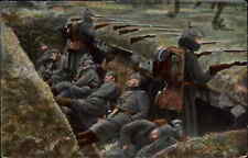 WWI German Trench Warfare Men Sleeping Rifles Helmets c1914 Postcard picture