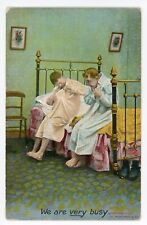 Postcard Bamforth Series No. 1089 We Are Very Busy Old People on Bed c1907 picture