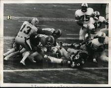 1975 Press Photo Miami Dolphins and Denver Broncos During Pro Football Action picture