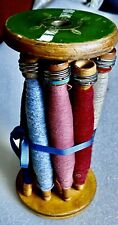 Vintage wooden Spool holding eight wooden spools of thread picture