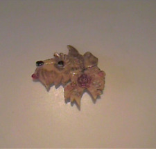 VINTAGE 1950'S CELLULOID PLASTIC SCOTTIE DOG WITH FLOWERS PIN picture