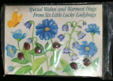 Vintage Avon Buttons on Greeting Card: 6 LADYBUGS on flower design, 1984, shank picture