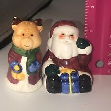 ￼Vintage ceramic salt and pepper shakers ￼Santa and reindeer Christmas Fun picture