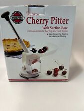 Norpro 5121 Deluxe Automatic Feed Tray Cherry Pitter 11 in. with Suction Base picture