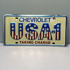 Chevrolet USA-1 Taking Charge License Plate Vintage Chevy Collectible picture