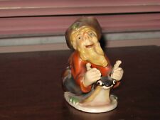 Vintage gnome figurine riding a snail 4 1/2
