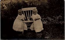 c1910 CUTE SMILING BABIES WITH APPLES BESIDE CHAIR REAL PHOTO RPPC 39-145 picture