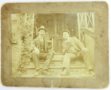 Two Men in Suit with Ties, and Hat Sit on Stairs to Porch - c.1900s Cabinet Card picture