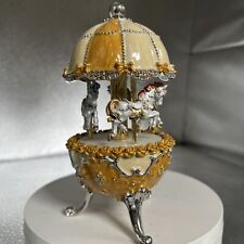 YELLOW FABERGE EGG MUSICAL HORSE CAROUSEL, BY KEREN KOPAL, WINDUP, WHITE HORSES picture