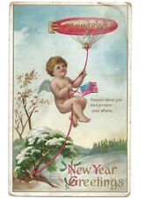 c1910 New Year Greetings Baby Cupid American Flag Blimp Int Art Pub Postcard picture