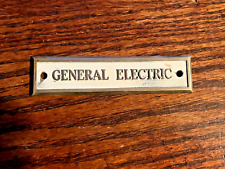VINTAGE GENERAL ELECTRIC  METAL EMBLEM TAG WHITE with GOLD?  LETTERING ORIGINAL picture
