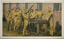 Army Life Soldiers Clean Rifles Postcard picture