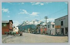 Valdez Alaska AK Main Street Cars Trucks Store Signs Chrome Postcard 1950s picture
