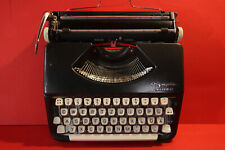 Vintage OLYMPIA SPLENDID 33 black typwriter w own black leather like case picture