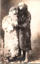 RPPC OF COUPLE IN FULL LENGTH FUR COATS IN A LOVING GAZE EARLY 1900s AZO RPPC picture