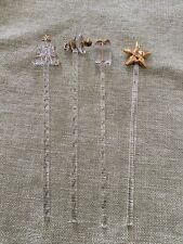 A Set Of Four Christmas Glass Stirrers picture