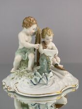 Antique Kpm figurine depicting cherubs with easel & painting subject. Meissen picture
