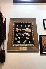 A framed group of Roman pottery fragments picture