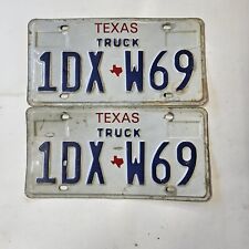 2004 Two Texas Truck License Plates 1DX-W69 picture