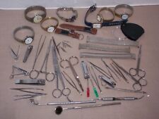 Junk drawer lot of watches, bands, medical tools, scissors, clippers, parts picture