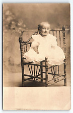 c1910 VERY CUTE BABY GIRL IN UNIQUE CHAIR STUDIO PHOTOGRAPH RPPC POSTCARD P4272 picture