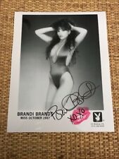 BRANDI BRANDT 8X10 BLACK & WHITE PLAYBOY PROMO SHOT WITH A KISS AUTOGRAPHED picture