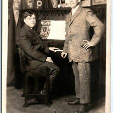 c1910s 2 Dapper Young Men & Universal Piano RPPC Dubuque, IA Clarence Brown A156 picture
