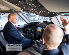 PRESIDENT DONALD TRUMP SITS IN THE COCKPIT OF A BOEING 787 - 8X10 PHOTO (AB-352) picture
