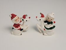 Vintage Christmas Salt and Pepper Shakers Santa and Mrs. Clause Riding Reindeer picture