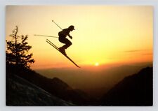 Ski The U.S.A. - Skier In The Air Silhouetted Against Sunset Postcard picture