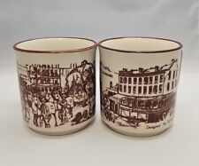 D H Holmes Coffee Mugs set 2 Cups NOLA New Orleans Canal Street King Rex Parade picture
