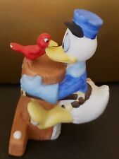 Vintage Walt Disney Prod Porcelain Donald Duck Figurine w Pier Post & Red Bird picture