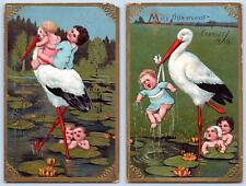 1909 SET/2 STORK DELIVERS BABIES LILY PADS HUMOROUS BLESSINGS & JOY POSTCARDS picture