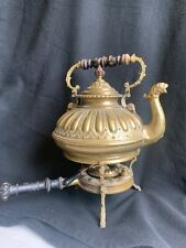 Antique moorish style brass kettle and warming stand picture
