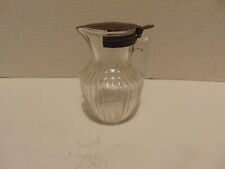 Antique 1915-1916 Clear Glass Syrup Pitcher / Tin Lid picture