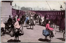 VINTAGE POSTCARD CROWDED STREET SCENE AT THE GREAT NILE BRIDGE IN EGYPT c. 1910 picture