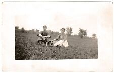 Rppc - Young Romantic Couple in Early Period Attire Sitting in a Field Vtg PC picture