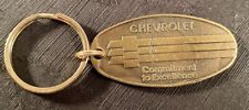 Vintage Chevrolet Commitment To Excellence Return Postage Solid Brass Keychain picture