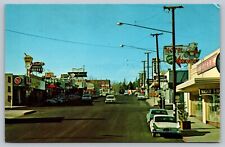 Victorville California CA Street Scene Postcard Drug Store Liquor TV Motel Signs picture