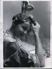 1960 Media Photo A Teenager Washes Her Hair picture
