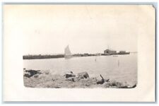 c1910's Shoreline Boathouse Sailboat View New London CT RPPC Photo Postcard picture