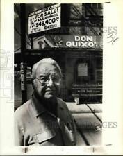 1974 Press Photo Noe Salinas standing in front of his building, Texas picture