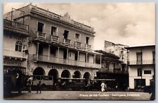 Touring Cars and Grocery Store - Plaza de los Coches Cartagena Colombia Postcard picture