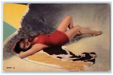 c1930's Beach Bathing Beauty Swimsuit Laying On Sand Umbrella Vintage Postcard picture