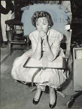 1956 Press Photo Ida Lupino, actress, studies script on movie set. - hpa85336 picture