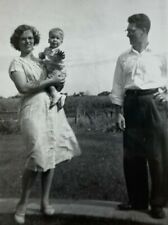 Woman Holding Baby Blowing Dress Man Watching B&W Photograph 3.5 x 5 picture