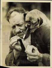 1931 Press Photo Pug Dog Smoking Cigarette - nei46051 picture
