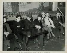 1941 Press Photo Customers seized in gambling raid at bookie joint Prospect Ave. picture